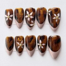 Amber Bloom fall press-on nail set with 3D floral accents and blush French tip