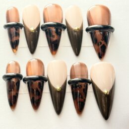 Whiskey Neat fall press-on nail set with copper shimmer and tortoiseshell tips