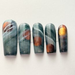 Blood Moon fall press-on nail set with garnet and copper marble eclipse design